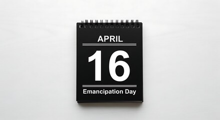 Black desk calendar showing april 16th, emancipation day, isolated on white background