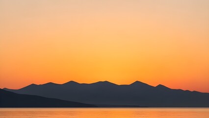 Fototapeta premium Golden Orange Sunset Sky Over Dark Mountain Silhouettes and Calm Water isolated PNG with Transparent Background