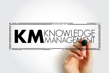 KM - Knowledge Management is the process of identifying, organizing, storing and disseminating information within an organization, acronym concept stamp