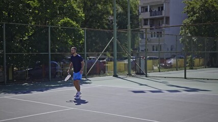 Friends passionately engage in a dynamic tennis match on a sunny outdoor court. This energetic and fun sport fosters connection and healthy competition.
