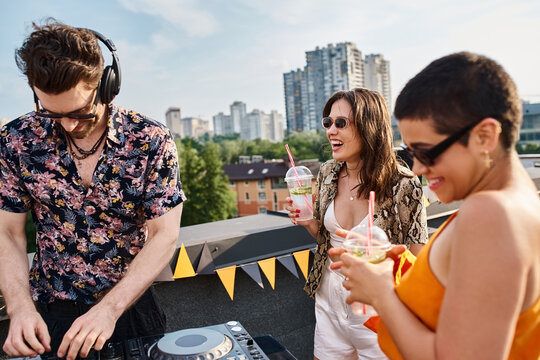 Young friends celebrate together on a vibrant rooftop party filled with laughter and music