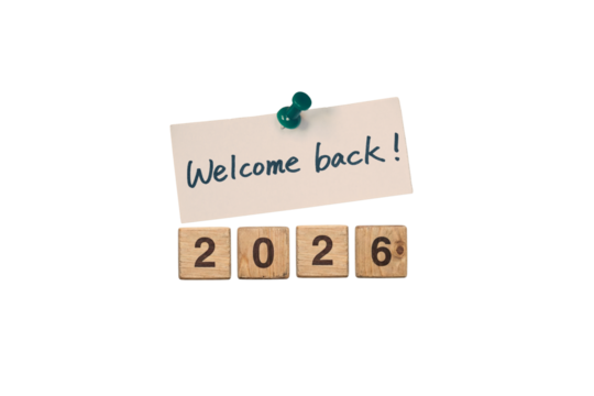 Welcome Back 2026 Note Pinned Above Wooden Number Blocks