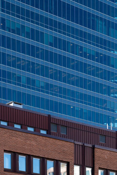 Modern architecture facade with geometric pattern, structure and urban lines expressed through minimalism and contrast for clean visual impact in commercial design