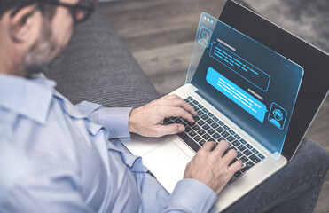 Man Interacting with a Virtual AI Assistant or Chatbot Interface on a Laptop for Digital Customer...