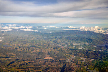 sorrounding of bogota aerial view from airplane window at sunset