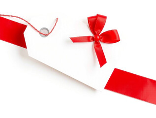 White gift tag with red ribbon and bow on white background