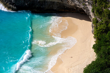 Aerial view of the waves at Crystal Bay beach Nusa Penida, Bali. High quality photo