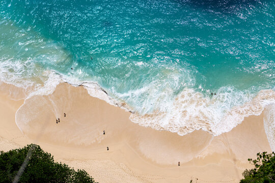 Aerial view of the waves at Crystal Bay beach Nusa Penida, Bali. High quality photo