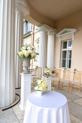 Wedding Ceremony Setup with Chairs and Flowers in Latvia