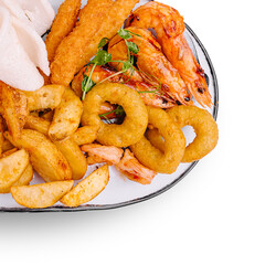 Seafood platter with shrimp, fried fish, and crunchy sides served on a plate