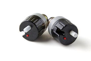 Old style electrical circuit breakers isolated on white background.