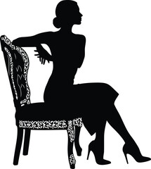 Stylish female figure in silhouette seated on a decorative antique chair, looking to the side, isolated on