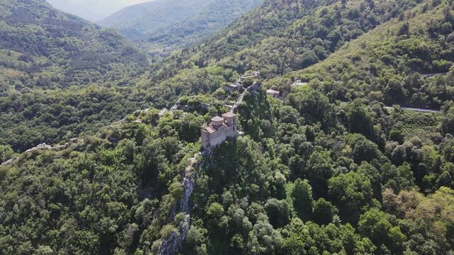 Aerial Spring view of Church of the Holy Mother of God at ruins of Medieval Asen Fortress, Asenovgrad, Plovdiv Region, Bulgaria