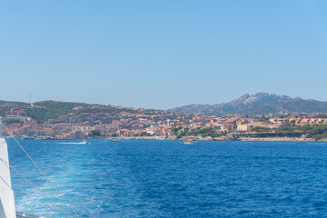 Fototapeta premium Ferry Wake and Distant Coast, Sardinian, La Maddalena, Italy