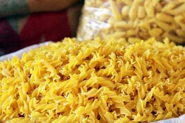 Pile of Egg Noodle Pasta Background Close Up Texture