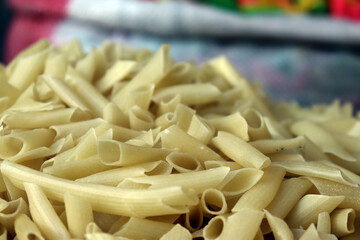 Pile of Penne Pasta Uncooked Food Ingredient Closeup