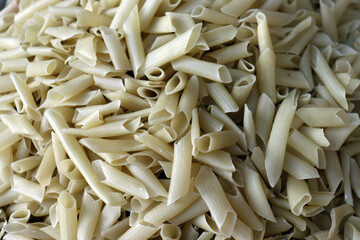 Uncooked Penne Pasta Pile Close Up Macro View