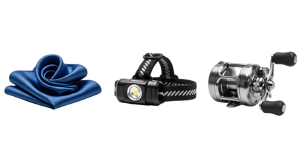 Fishing gear set including a fishing reel, headlamp, and blue cloth, essential equipment for night fishing or angling trips