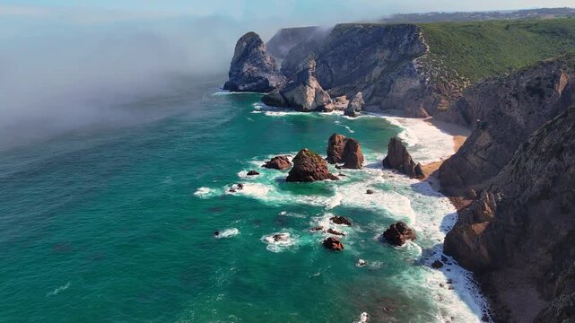Aerial View of Cabo da Roca&rsquo;s Rugged Cliffs and Wild Beaches &mdash; Dramatic Atlantic Coastline and Untouched Nature Captured by Drone in Portugal&rsquo;s Westernmost Point