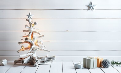 A rustic white driftwood advent christmas tree decorated with stars snowflakes and gift boxes on a white wooden backdrop perfect for the festive holiday season christmas or new year celebrations copy 
