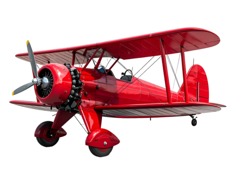 Classic red biplane with open cockpit against black background