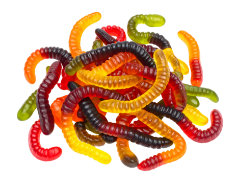 Colorful gummy worms in a pile of assorted flavors