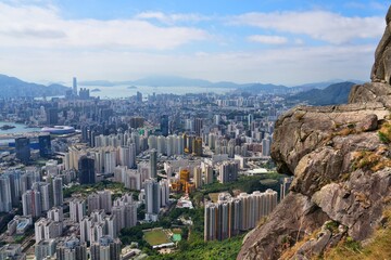 Fototapeta premium Hong Kong cityscape with public housing residential estates in Kowloon Bay District of Kowloon, Hong Kong. View from Sunset Ridge rocks.