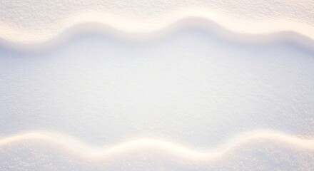 Smooth snow texture with wavy patterns under natural light  