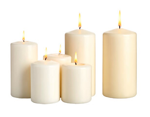 Five lit pillar candles, varying sizes