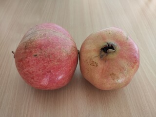 pomegranate on wooden table