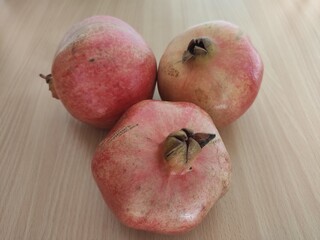 pomegranate on a wooden table