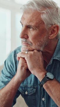 Stress, senior man and thinking in home for retirement debt, regret financial mistake and pressure. Pensioner, elderly person and overthinking in living room with finance crisis, overwhelmed or worry