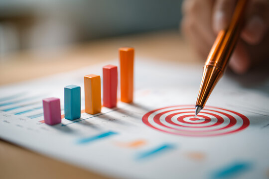 Business target growth of new year concept, Businesswomen analyzes business growth by graphics, Target plan, goal setting objectives and success, New Year's start-up for long-term investments