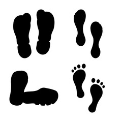 Set of black human foot and shoe prints on white background