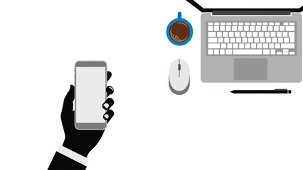 Overhead View of Hand Holding Smartphone at Desk with Laptop and Coffee