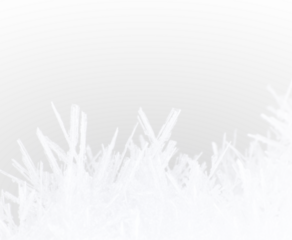 snow frost in the form of natural patterns on the window pane against the background of the morning sky
