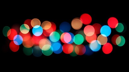 Vibrant colorful bokeh on dark black background with soft glowing round light circles, ideal for festive abstract designs, holiday backdrops, modern digital wallpapers, and creative blur light effects