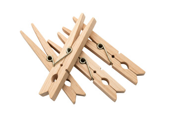 Isolated wooden clothespins scattered randomly, laundry drying clips, natural wood pins