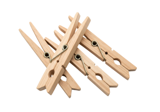Isolated wooden clothespins scattered randomly, laundry drying clips, natural wood pins