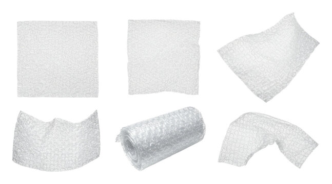 Multiple bubble wrap sheets and roll isolated on transparent background