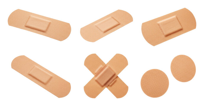 Assorted adhesive bandages in different shapes on transparent background