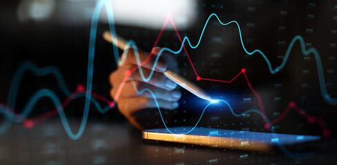 Digital Data Analysis on Tablet with Stylus and Financial Graph Visualization.