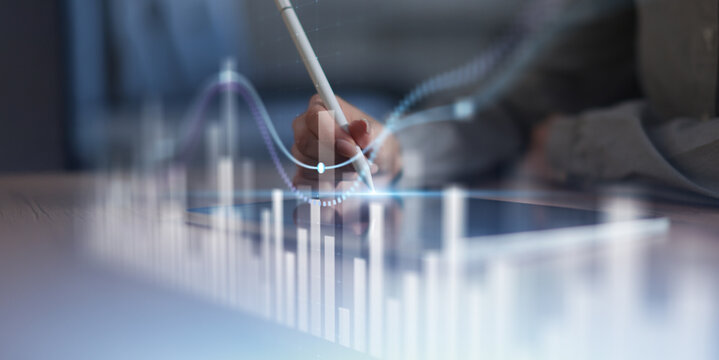 Interactive Data Visualization and Business Analytics Interface Projected on Virtual Screen.