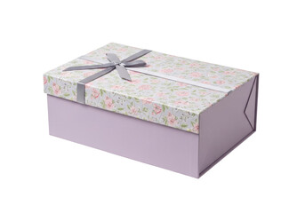 Isolated rectangular gift box with gray ribbon and floral top against a plain backdrop