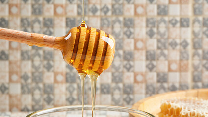 Pouring golden honey kitchen table food photography cozy home setting close-up sweetness and nature