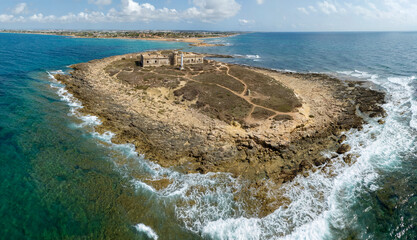 Panoramic aerial view of the Isola delle Correnti. It is a small island in Sicily, Italy, located...