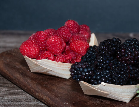 close up of fresh berries strawberries raspberries blackberries