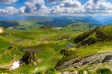View from the Urdele Pass of the glacial lakes and the Parang Mountains. Southern Carpathians, Transalpina, Romania