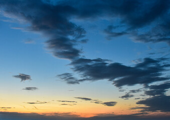 Enchanted sky filled with glowing sunset hues in a calming afternoon moment