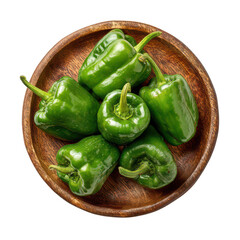 Green bell peppers on a wooden plate isolated isolated on transparent background